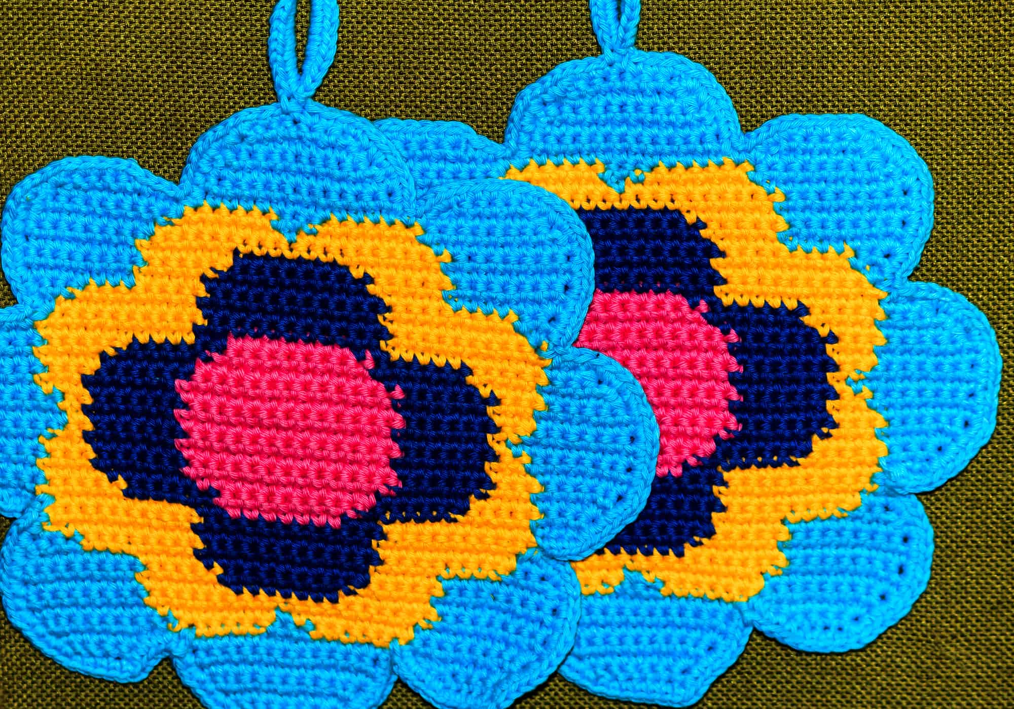 Crochet potholder, colorful flower 