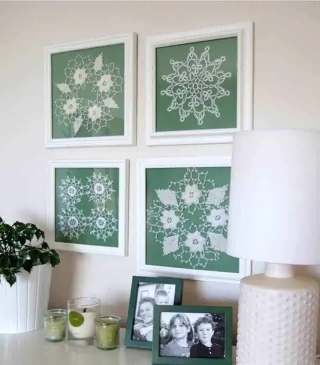 Framed crochet doilies displayed as wall art