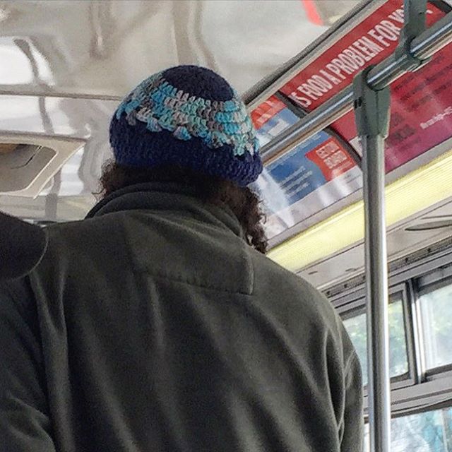 crochet blue hat spotted on bus
