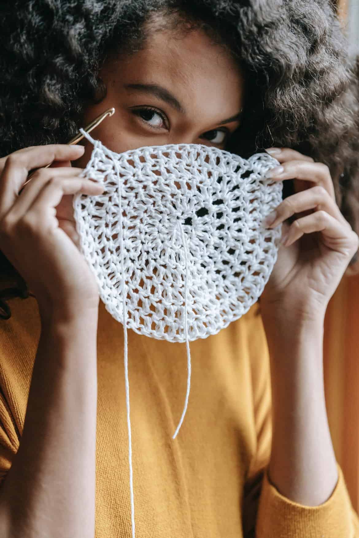 Woman Showing Her Crocheted Work