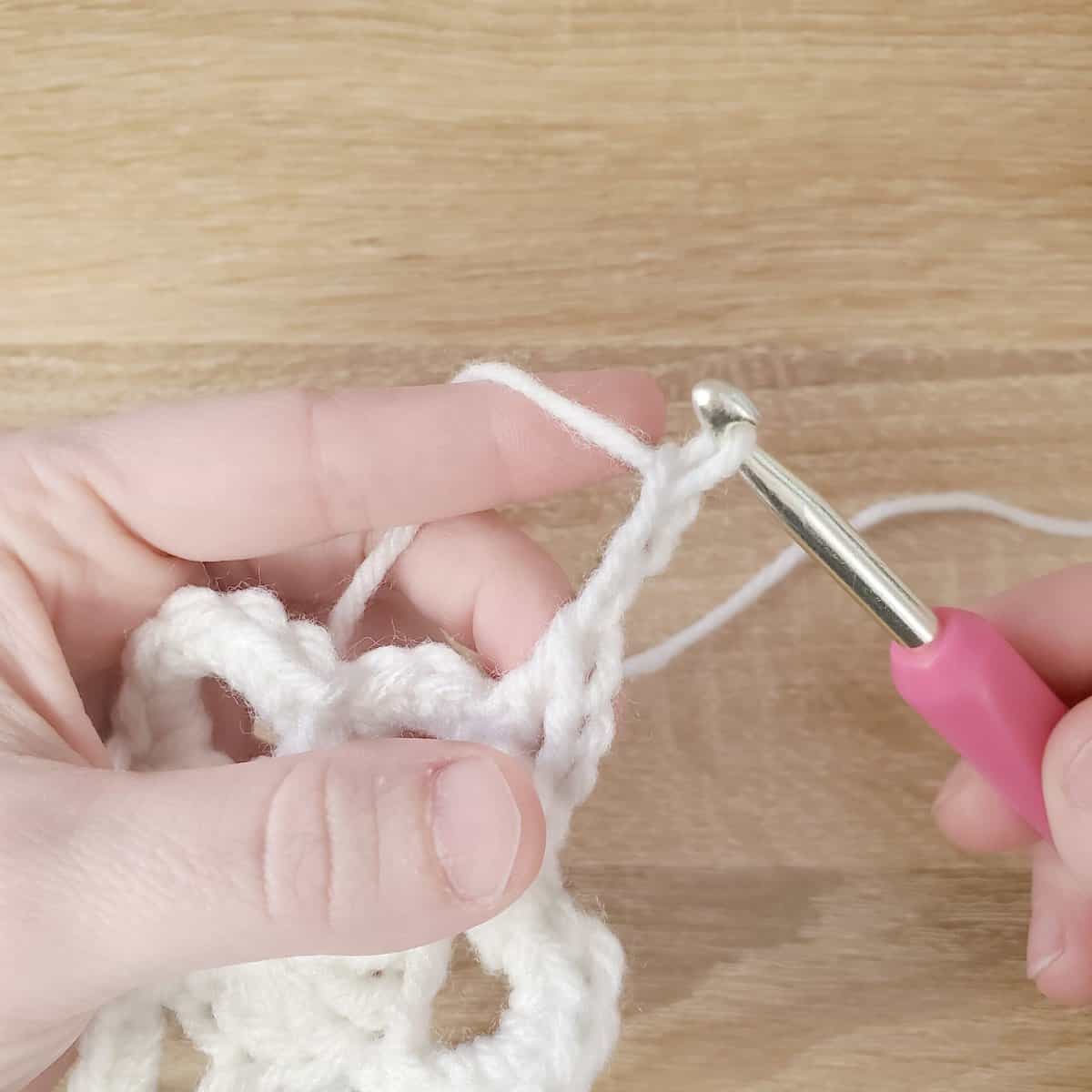 adding a picot stitch to the top of the double crochet