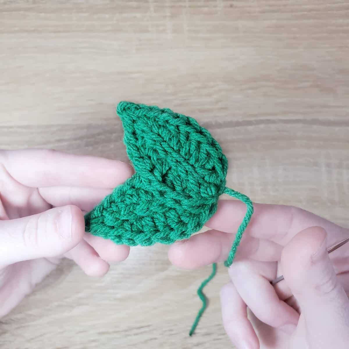 sewing the two leaves together