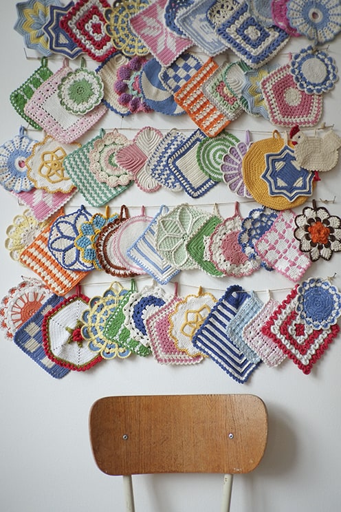 a fun and well displayed collection of crocheted potholders one of 8 picks for this weeks Friday Favorites