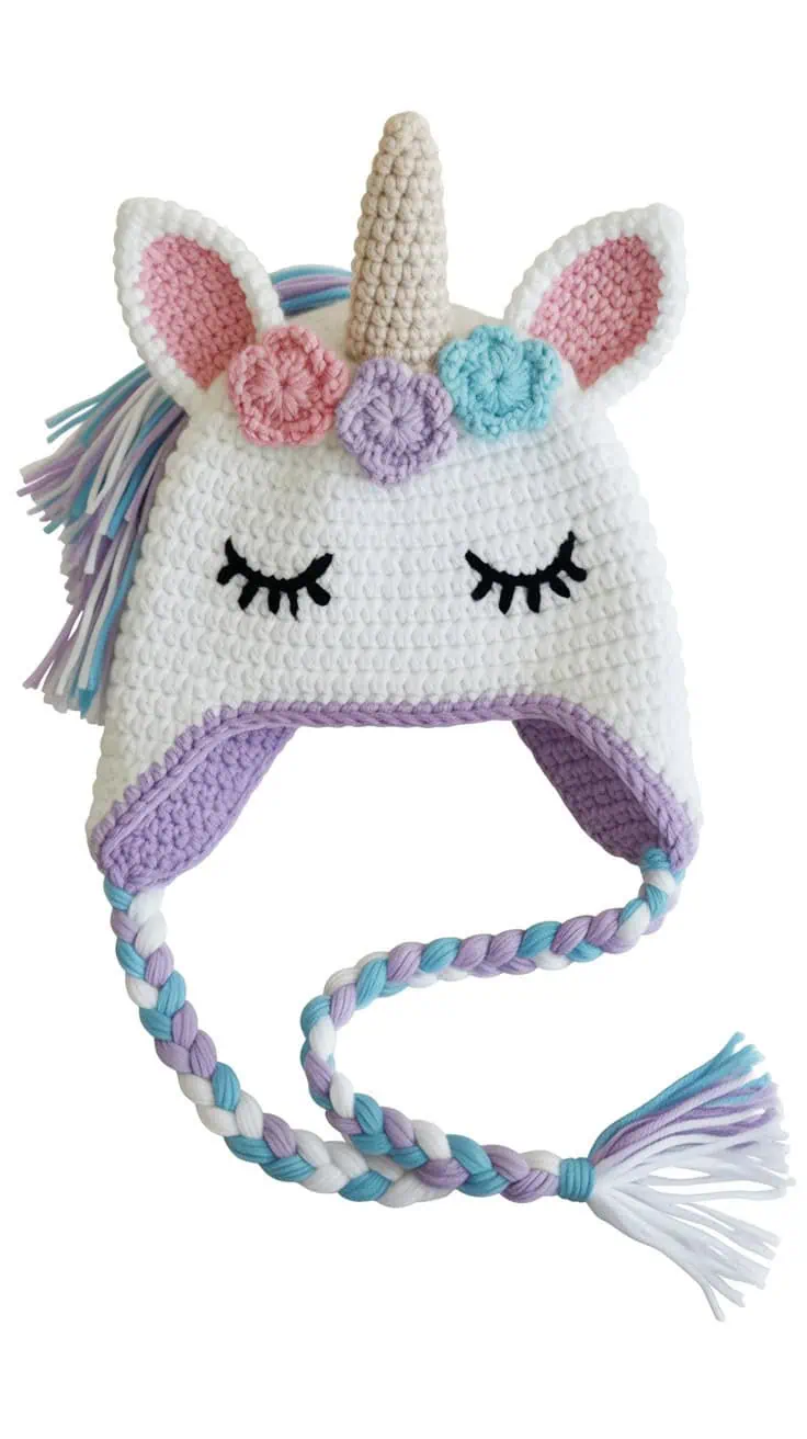 22 Unicorn Hat Crochet Patterns: Create Magical Hats for All Ages 32 a handcrafted white crocheted unicorn