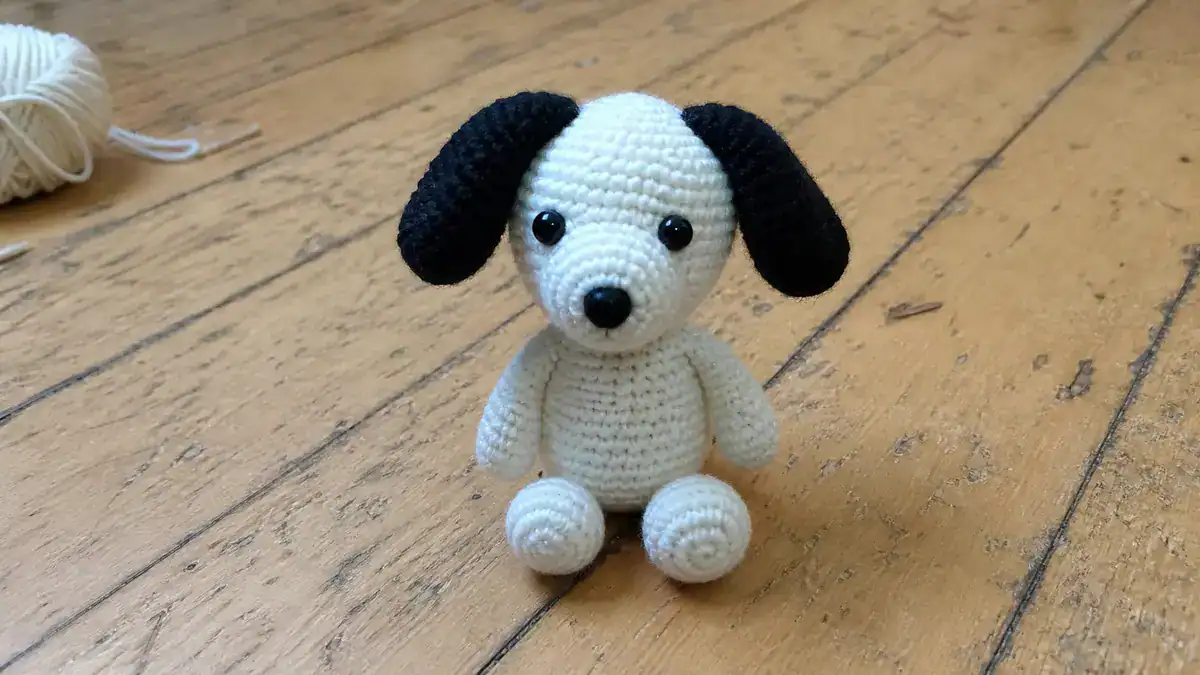30 Snoopy Crochet Patterns for Peanuts Fans: Amigurumi, Keychains, and Holiday Makes, handmade crochet project