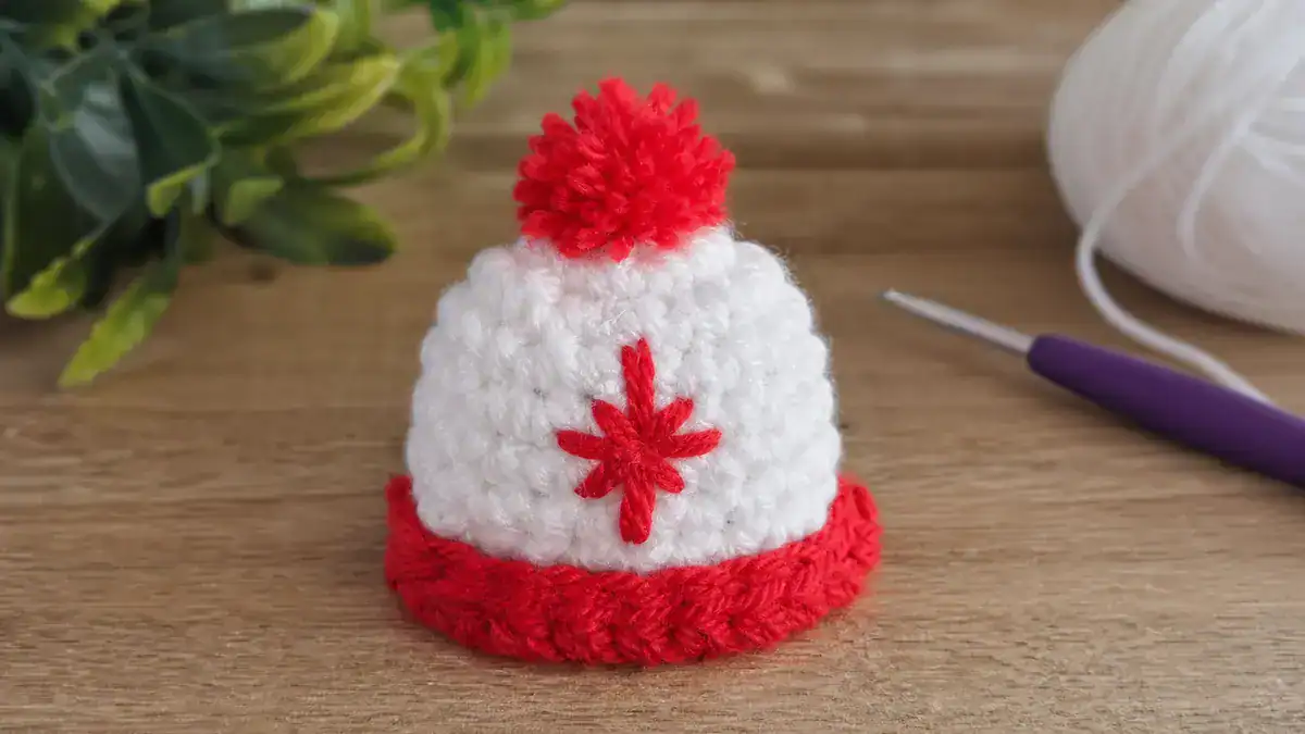 Mini Pom-Pom Hat Crochet Pattern: Free Festive Crafting!, handmade crochet project