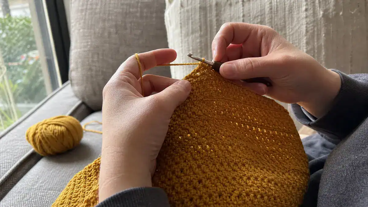 20 Lovely Images of Needleworkers in Action for Inspiration, handmade crochet project