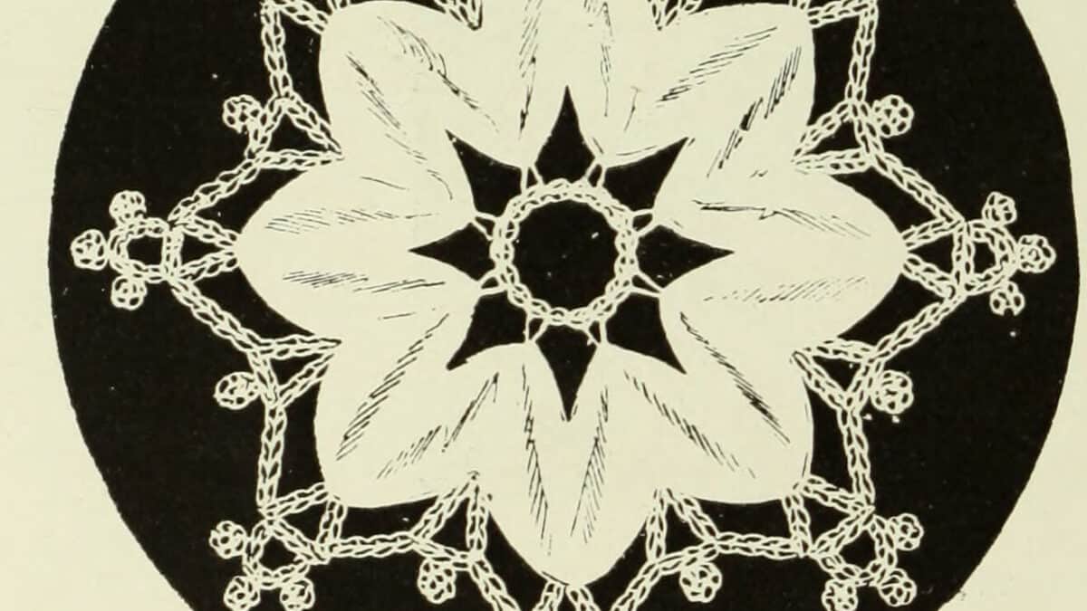 Engraving of a Chinese tape rosette with a crochet picot border, reversed out on a black ground, from The Dictionary of Needlework